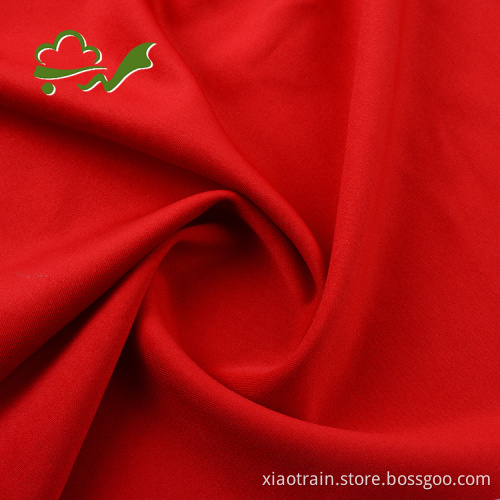 Tissu spandex de vêtement doux uni tricoté rouge
